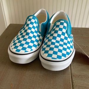 Brand new Vans checkerboard slip/ons
